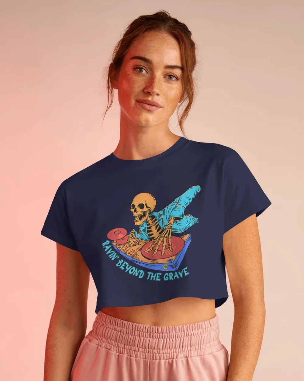 Ravin’ Beyond the Grave Skeleton DJ | Women’s 180 GSM Cotton Crop Top - Image 3
